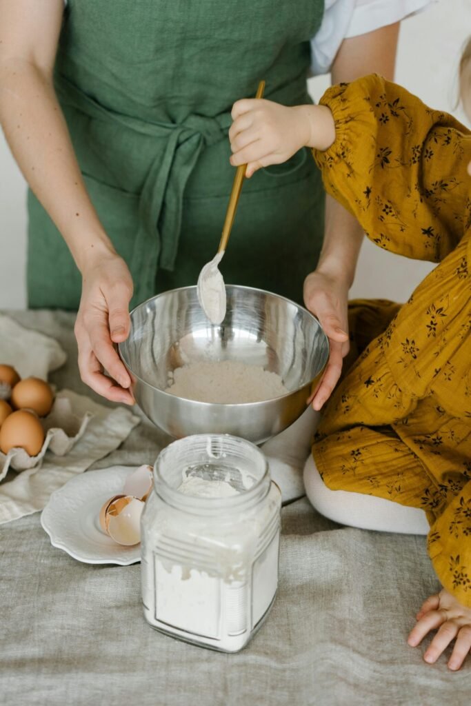 Mom and Toddler Baking in Kitchen